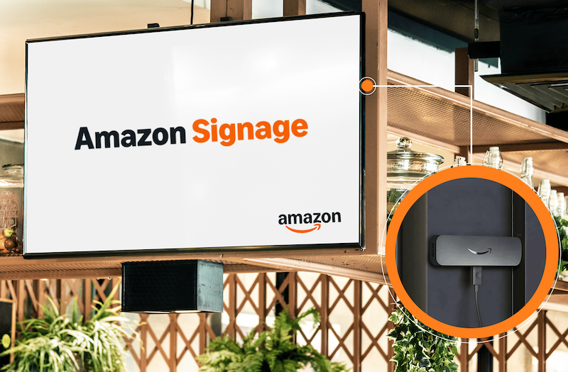 Amazon Signage Stick plugged into restaurant TV display — HDMI digital signage media player